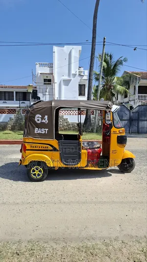 Bajaj RE 2024 Yellow