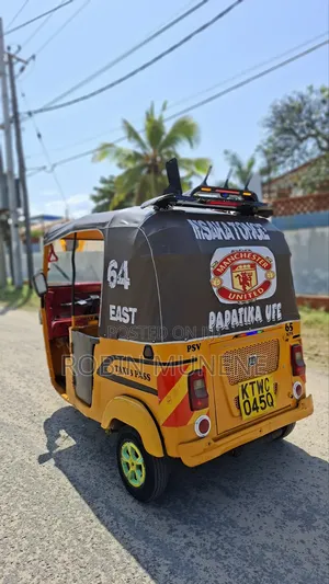 Bajaj RE 2024 Yellow