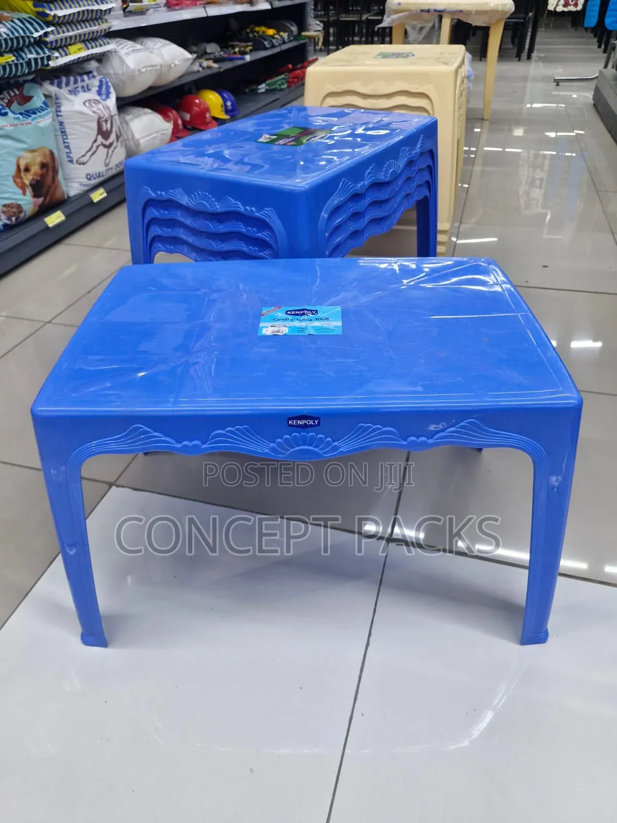 Long Arm Chair + Small Plastic Coffee Table.