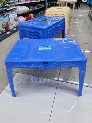 Long Arm Chair + Small Plastic Coffee Table.