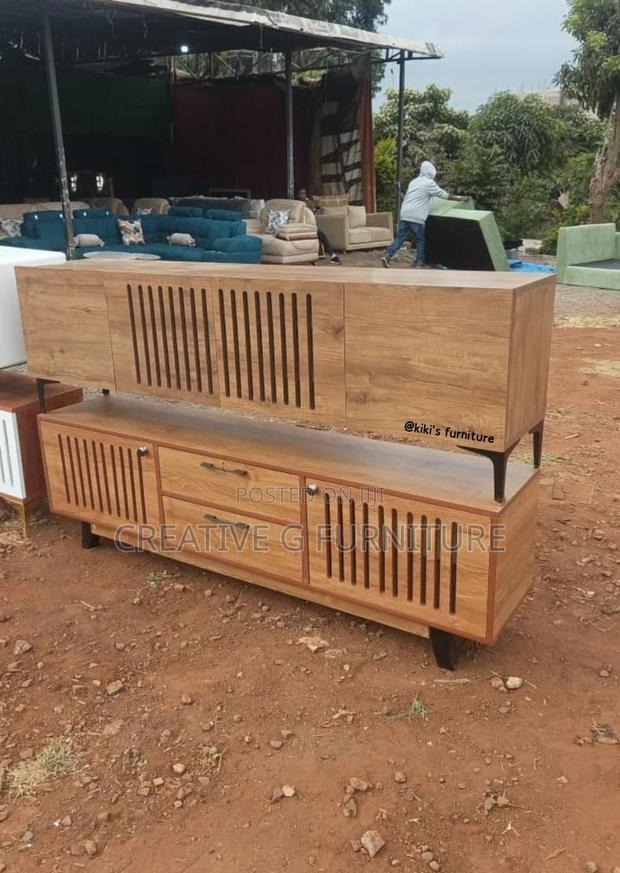 Modern Wooden TV Stand With Slatted Design - thumbnail 2