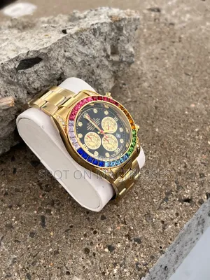 Rolex Daytona Rainbow Watch. Available in Silver and Gold.
