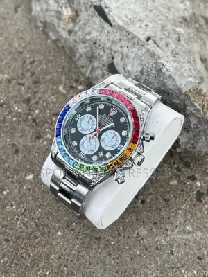 Rolex Daytona Rainbow Watch. Available in Silver and Gold.