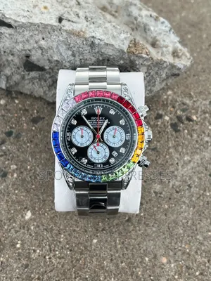 Rolex Daytona Rainbow Watch. Available in Silver and Gold.