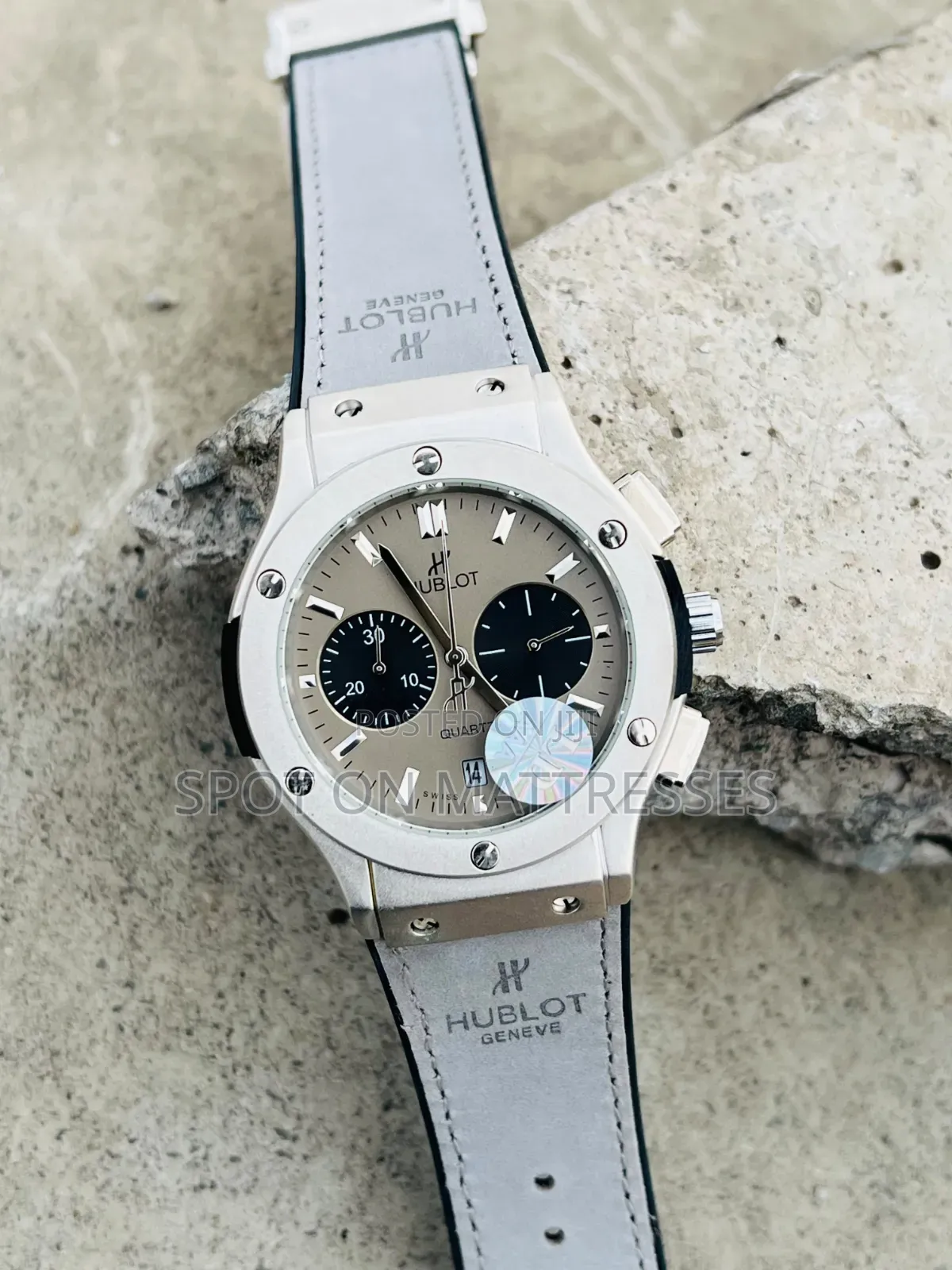 Hublot Geneve Chronograph Watch. Available in Grey and Black.