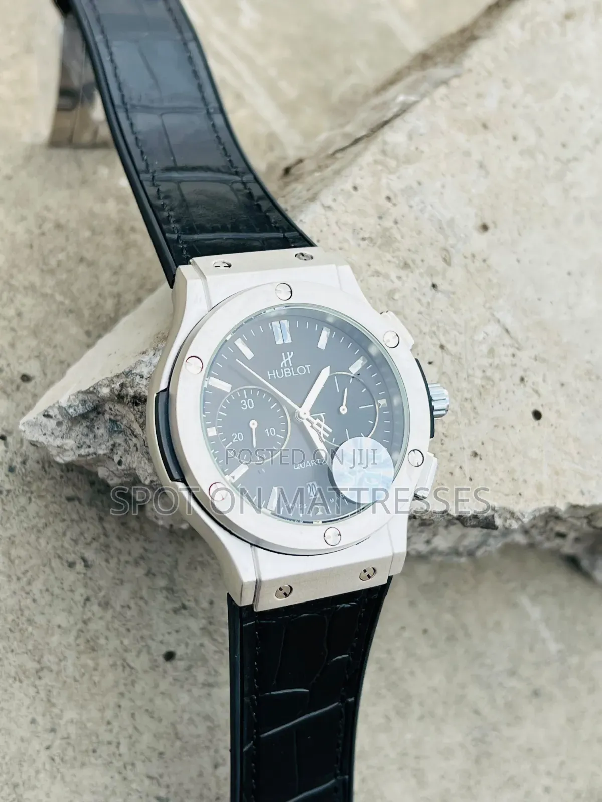 Hublot Geneve Chronograph Watch. Available in Grey and Black.
