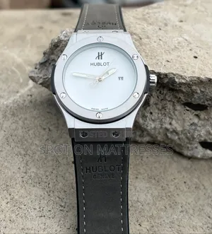 Hublot Geneve Chronograph Watch. Available in Grey and Black.