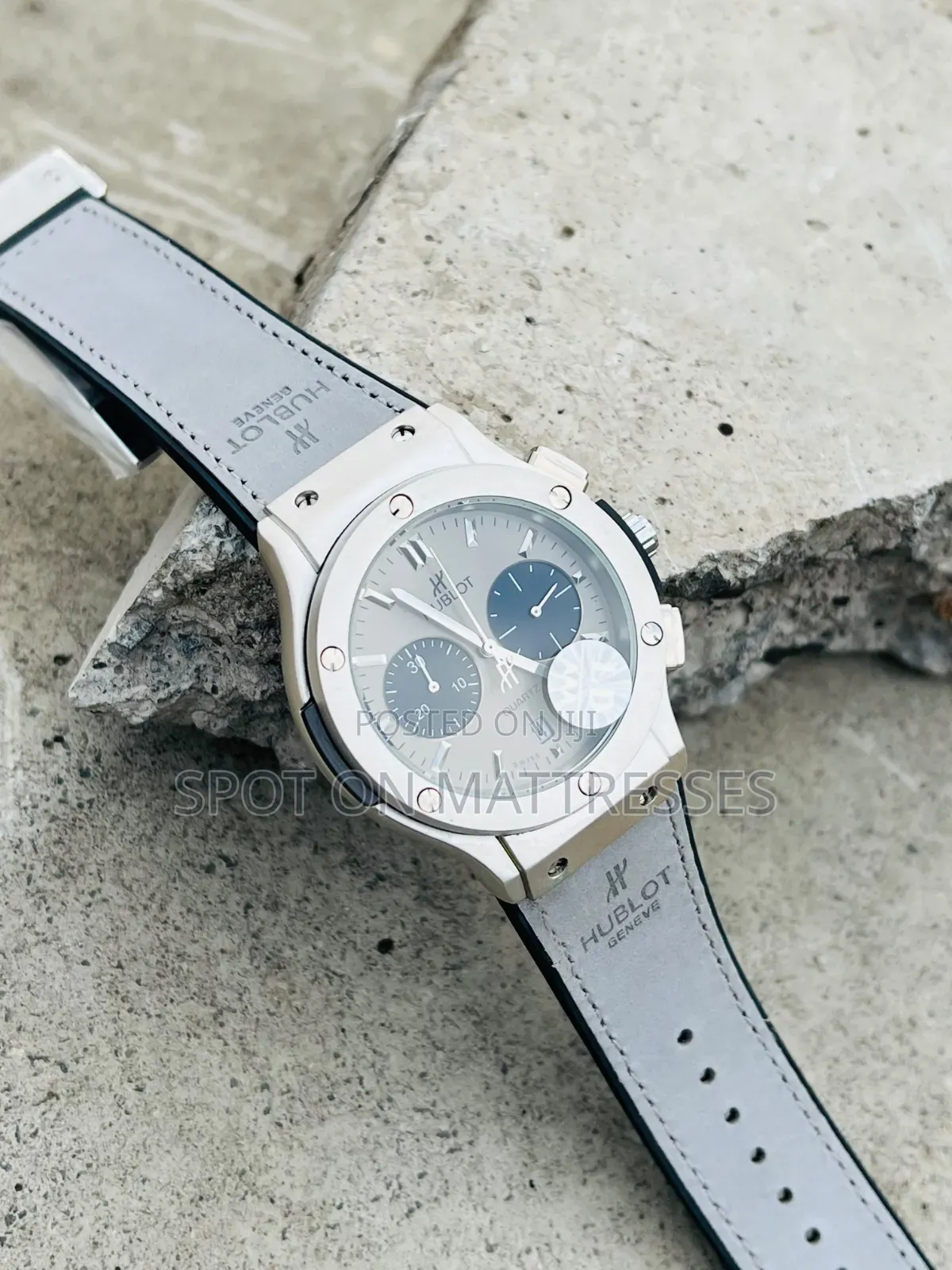 Hublot Geneve Chronograph Watch. Available in Grey and Black.