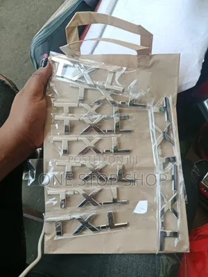 TXL Badge Durable Electroplated ABS Plastic Material