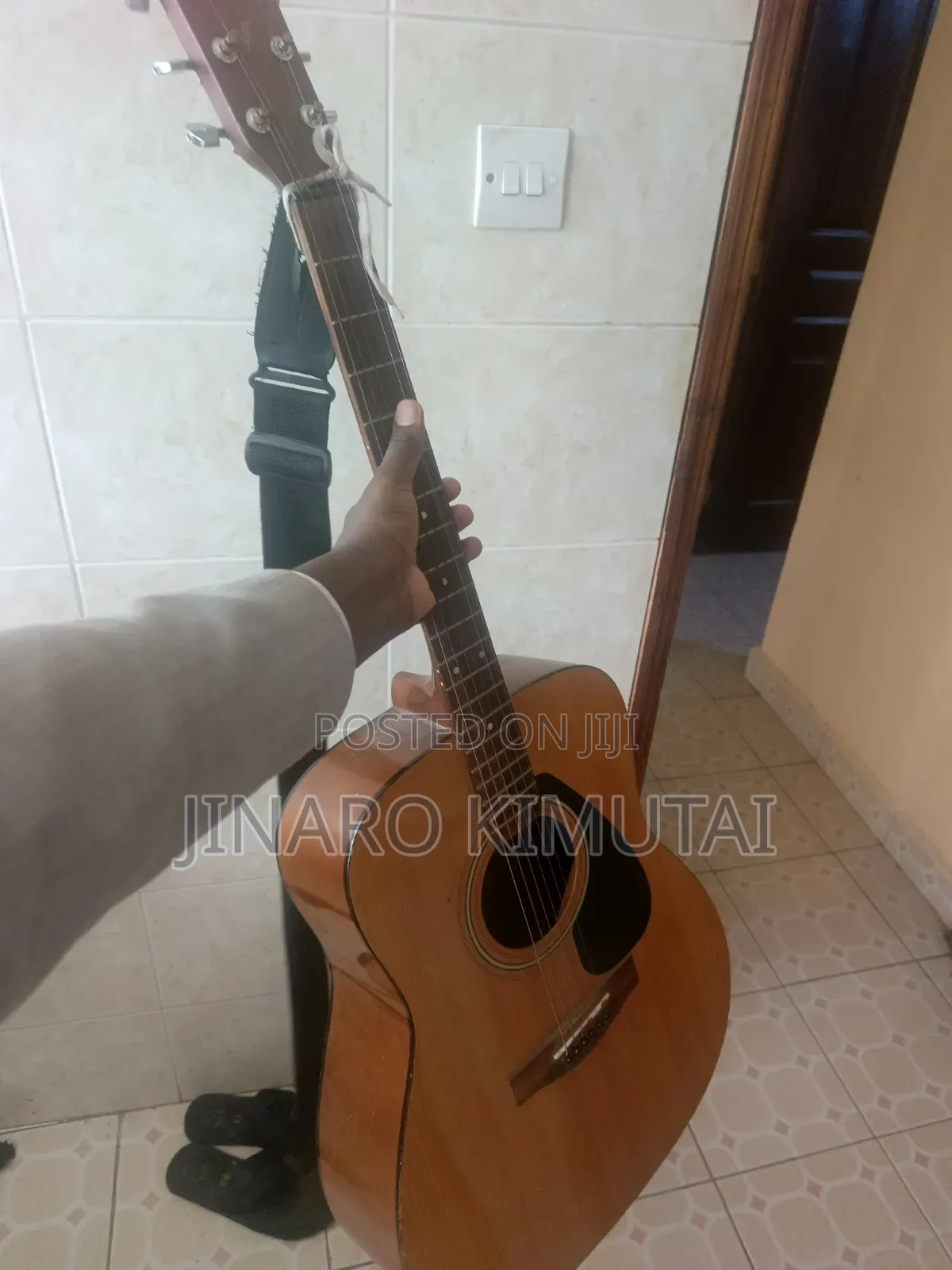 Yamaha Acoustic Guitar With a Capo.