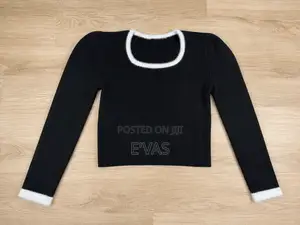 Black Ribbed Ladies Sweater Top With Fur Trim