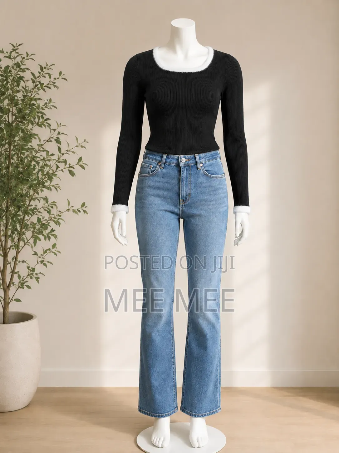 Black Ribbed Ladies Sweater Top With Fur Trim