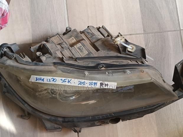 RHS BMW 1320 2012-2014 Headlight - main view