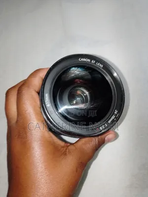 Canon Zoom Lens EF 24-70mm and Camera With Canon Zoom Lens EF 35-80mm