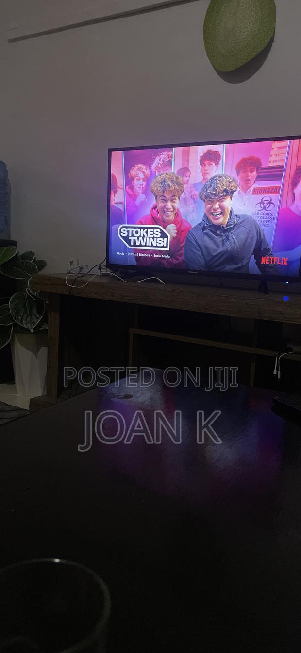 TV and TV Stand - thumbnail 2