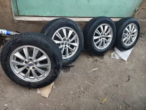 15 " Subaru Impreza Original Rim Set With Fairy Used Tires.