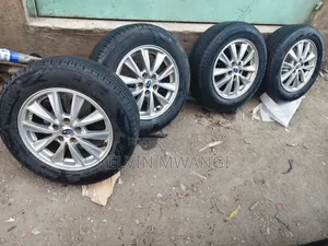 15 " Subaru Impreza Original Rim Set With Fairy Used Tires.