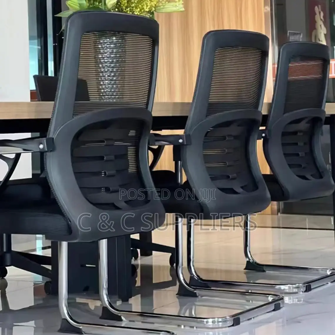 Ergonomic Non Swivel Mesh Guest Chair.