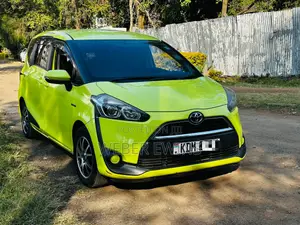 Toyota Sienta 1.5 Hybrid FWD (6-seater) 2015 Yellow