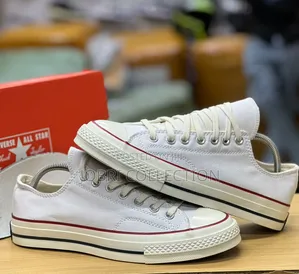 All White Converse Chuck Taylor Low Cut Sneakers