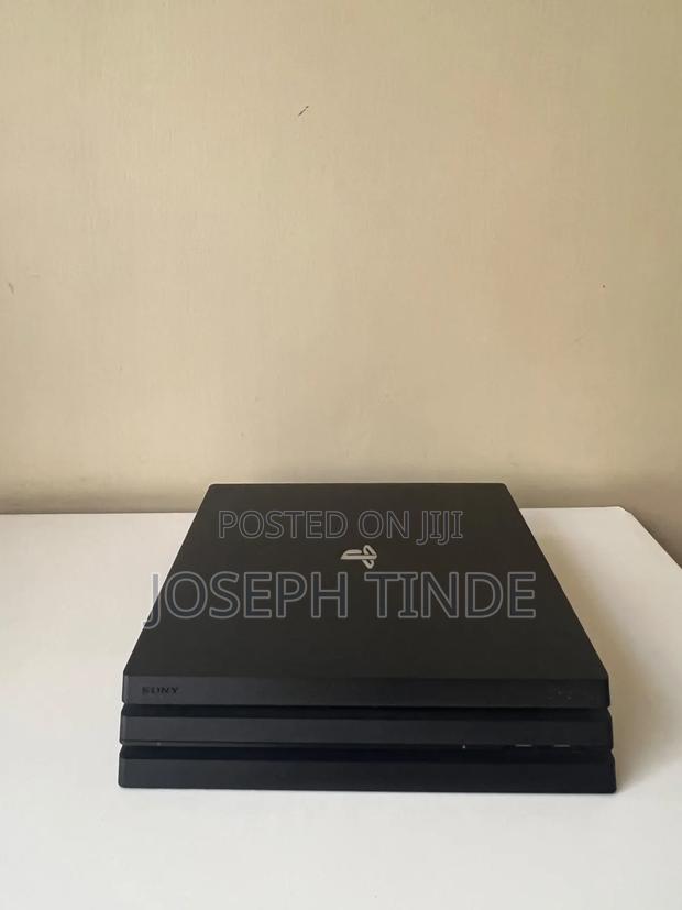 PlayStation 4 Pro With One Extra Controller - main view