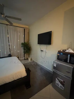 Cozy Studio at Grand Midtown Apartments