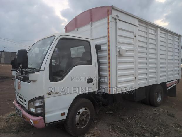 Isuzu NMR 2017 White - thumbnail 3