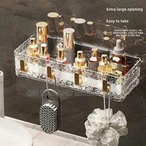 Acrylic Wave Patterned Storage Shelf With Gold Colored Hooks