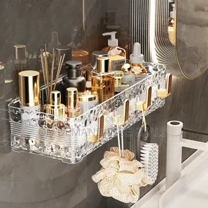 Acrylic Wave Patterned Storage Shelf With Gold Colored Hooks