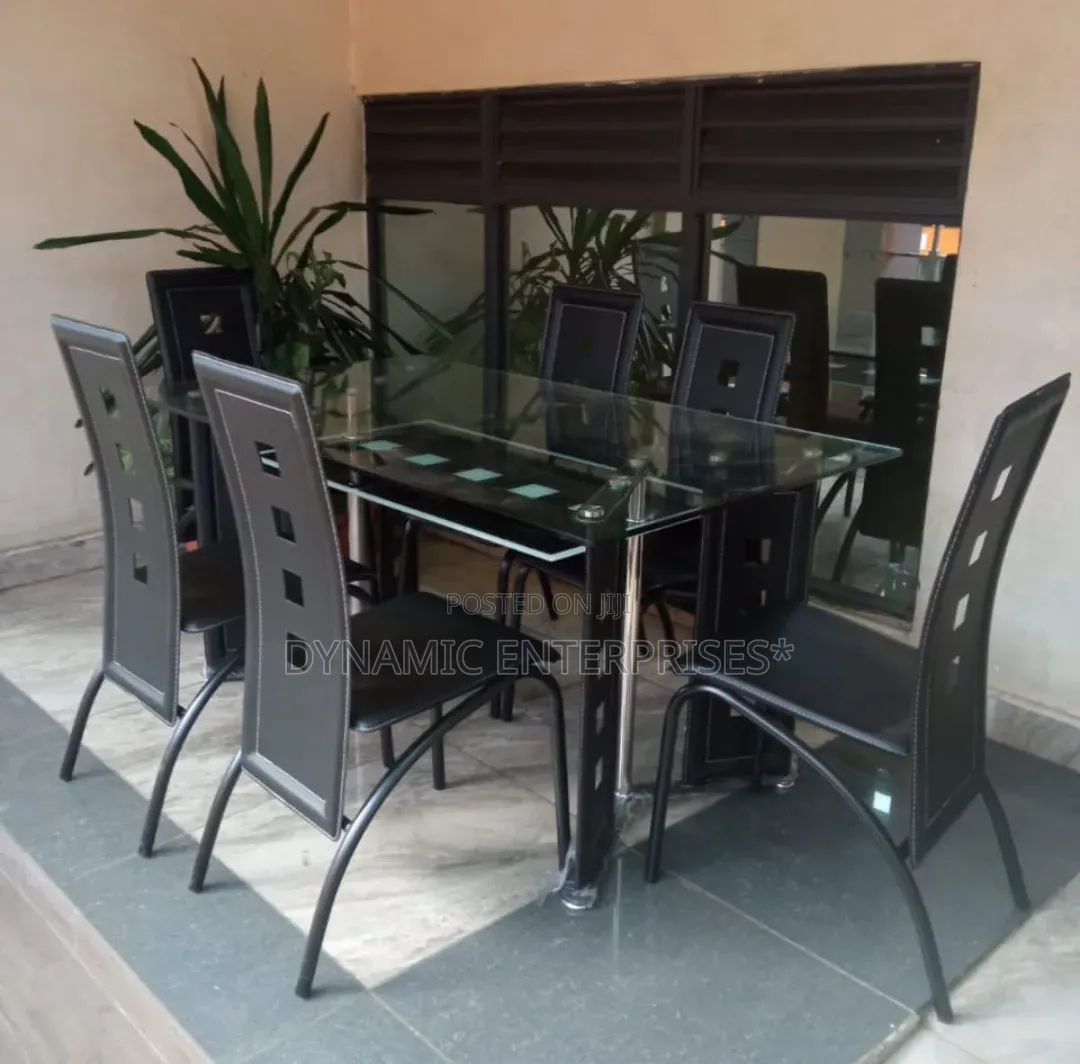 Executive 6 Sitter Glass Dinning Table With Leather Seat