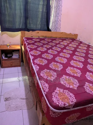 5 by 6 Bed and Mattress With Drawers and Bedside Table
