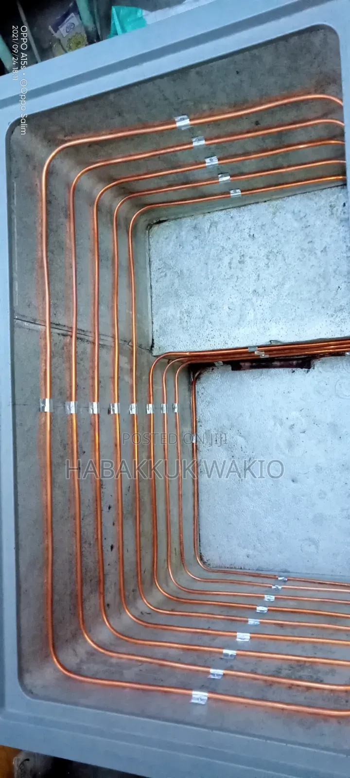 Fundi Wa Fridge = Refrigeration Technician