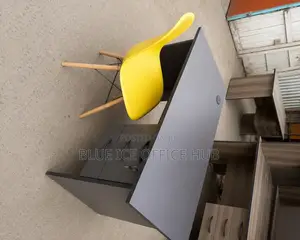 Grey Office Desk With White Eames Chair