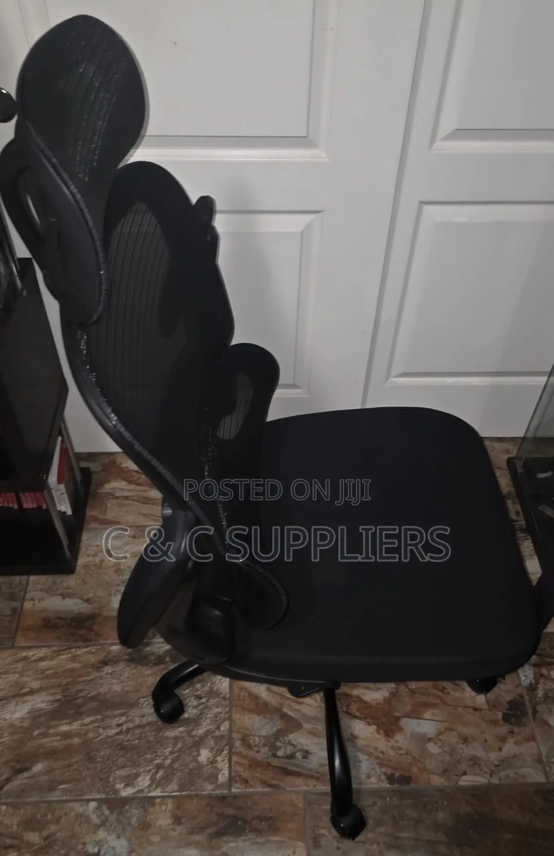 Ergonomic Revolving Mesh Office Chair.