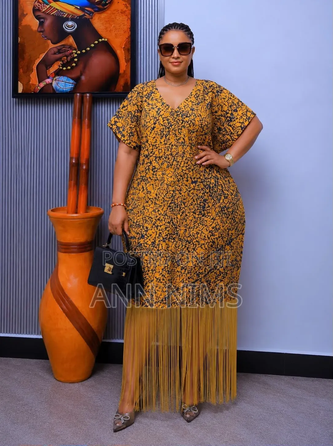 A Free-Flowing, v-Neck Dress With Statement Fringe Hem