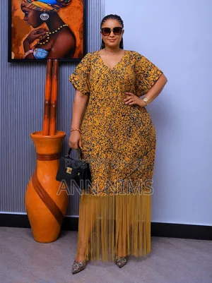 A Free-Flowing, v-Neck Dress With Statement Fringe Hem