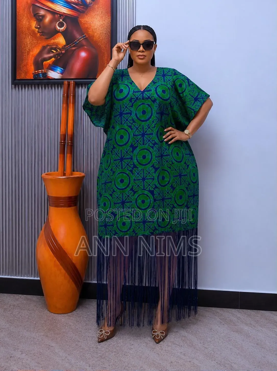 A Free-Flowing, v-Neck Dress With Statement Fringe Hem