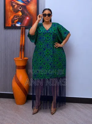 A Free-Flowing, v-Neck Dress With Statement Fringe Hem