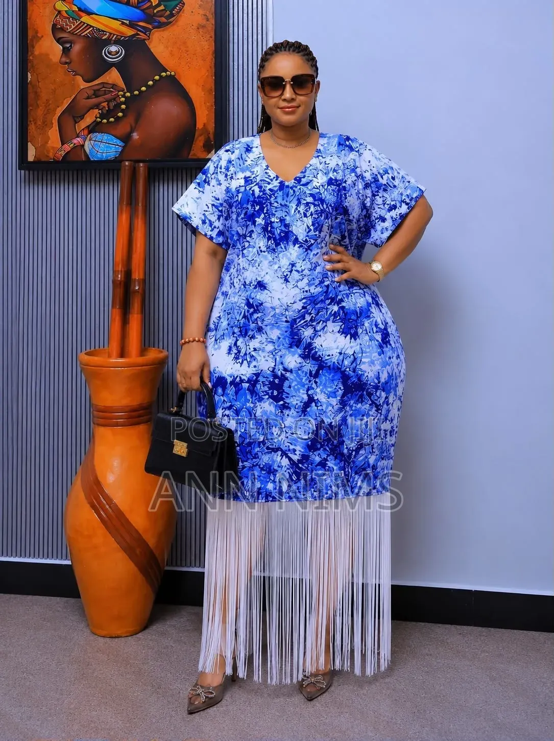 A Free-Flowing, v-Neck Dress With Statement Fringe Hem
