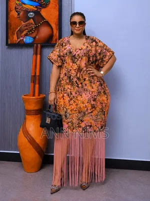 A Free-Flowing, v-Neck Dress With Statement Fringe Hem