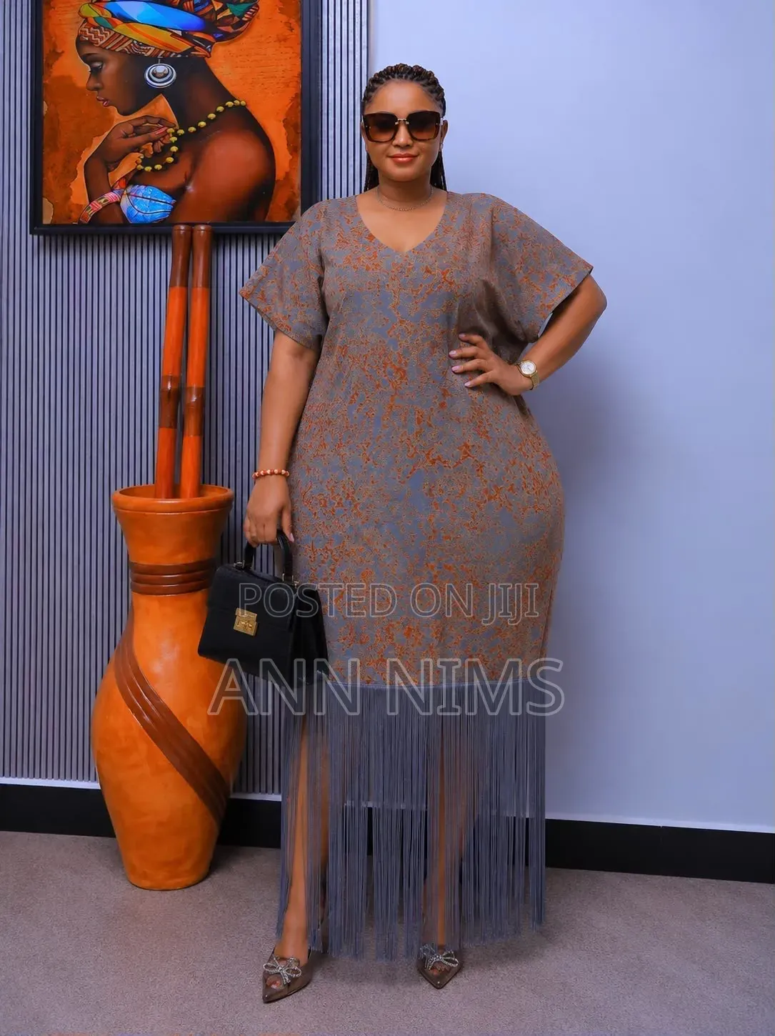 A Free-Flowing, v-Neck Dress With Statement Fringe Hem