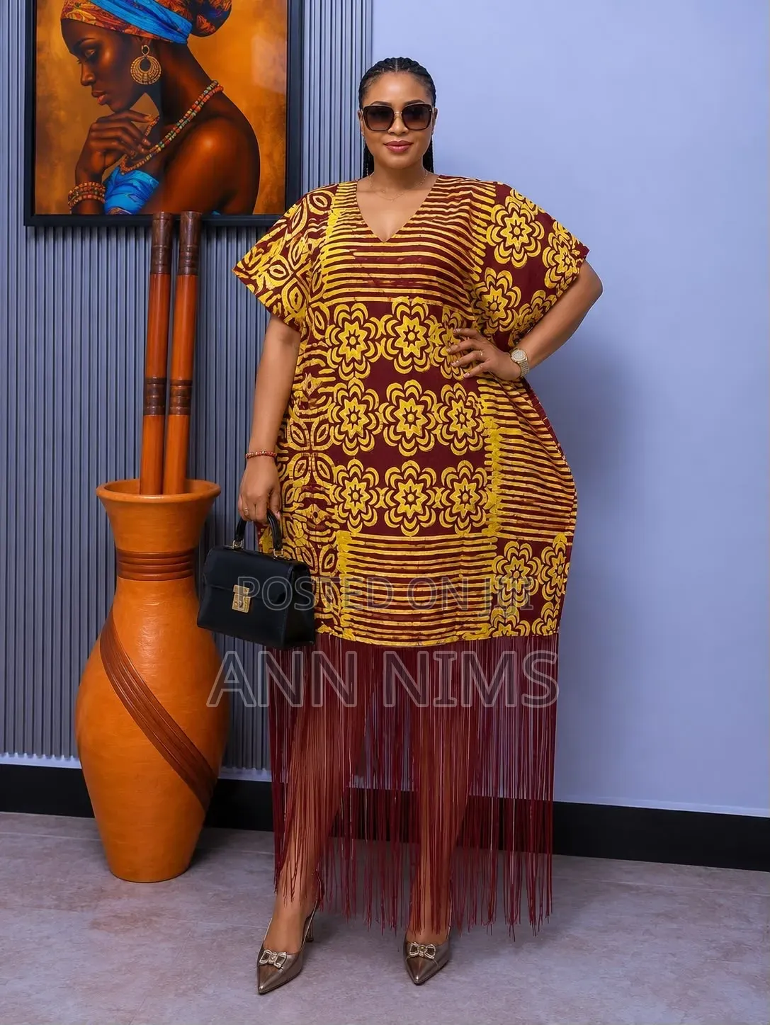 A Free-Flowing, v-Neck Dress With Statement Fringe Hem