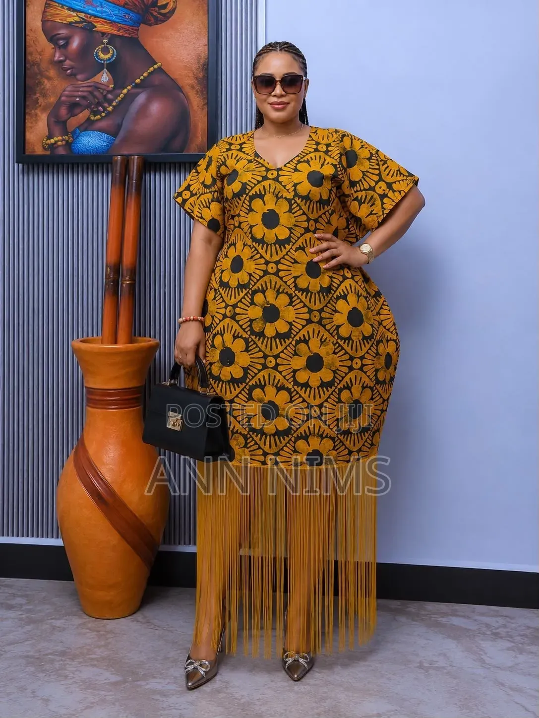 A Free-Flowing, v-Neck Dress With Statement Fringe Hem