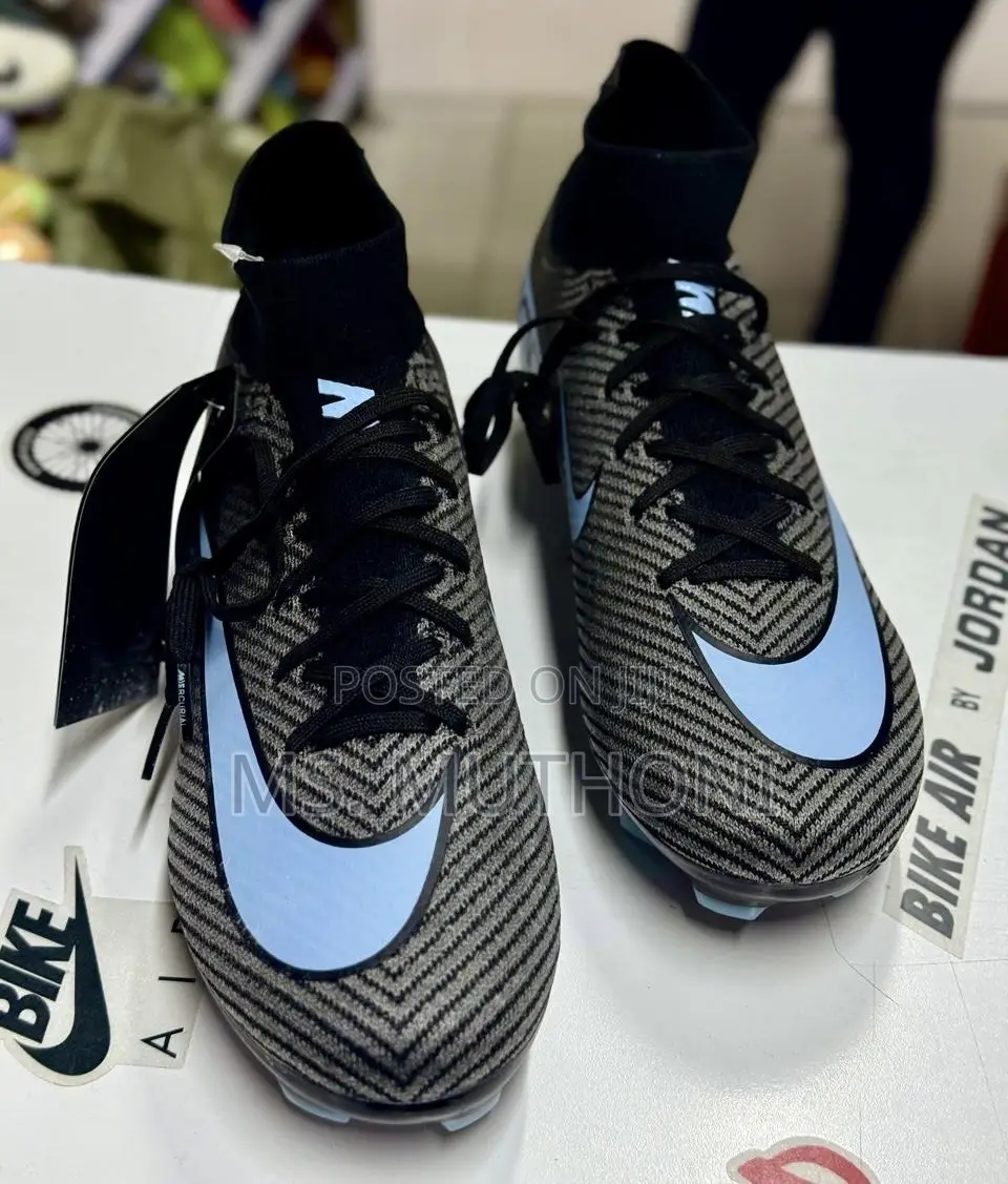 black-and-Grey Nike Zoom Mercurial Vapor 16.