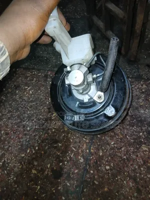 Nissa E12 Brake Booster Plus Master Cylinder Complete