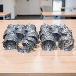 Protective 100mm,200mm, 450mm 6m /8m/10m Length Barbed Razor Wire