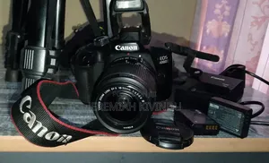 Canon EOS 4000D DSLR Camera + 2 Batteries + Charger + Tripod