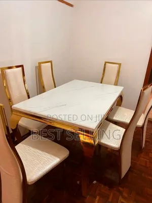 Prestige Dining Table With Golden Stands