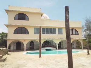 4 Acres of Land in Watamu With Beach Front Plus 4BR House