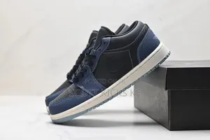 Nike Air Jordan 1 Low SE 'Black Dark Obsidian Snakeskin'.